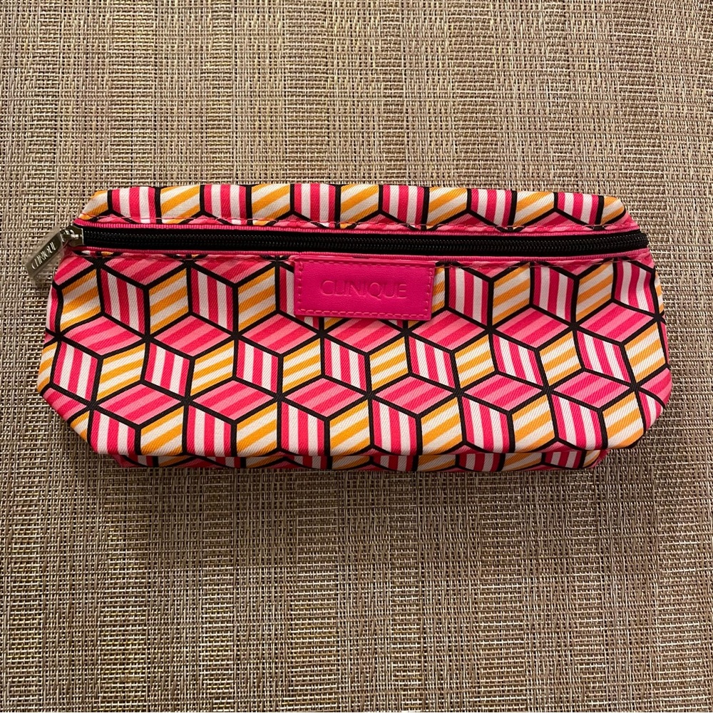 Clinique multi color print cosmetic bag.             NWOT
